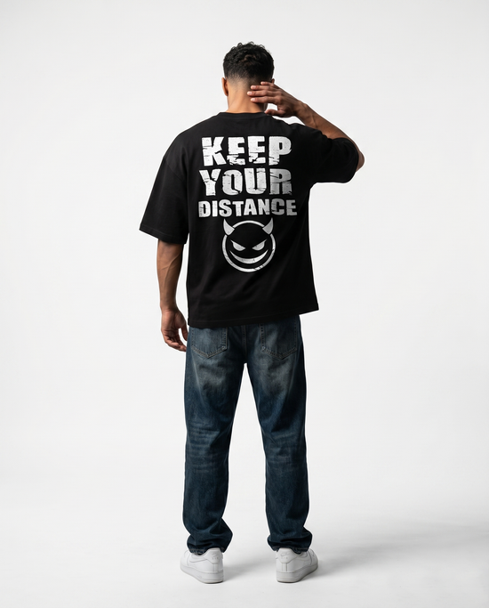 GRPHX The Outcast Heavyweight 240 GSM black oversized t-shirt front view - Devil Smile graphic