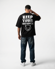 GRPHX The Outcast Heavyweight 240 GSM black oversized t-shirt front view - Devil Smile graphic