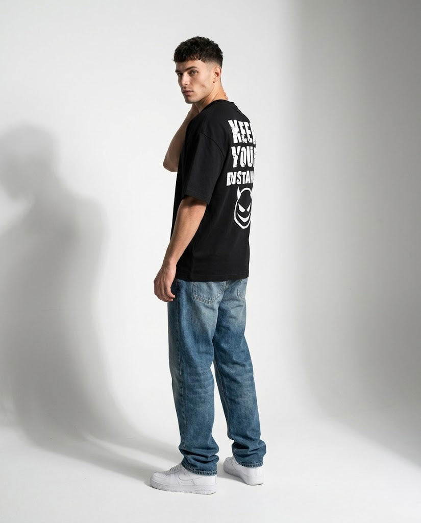GRPHX The Outcast Heavyweight back view - KEEP YOUR DISTANCE distressed graphic print
