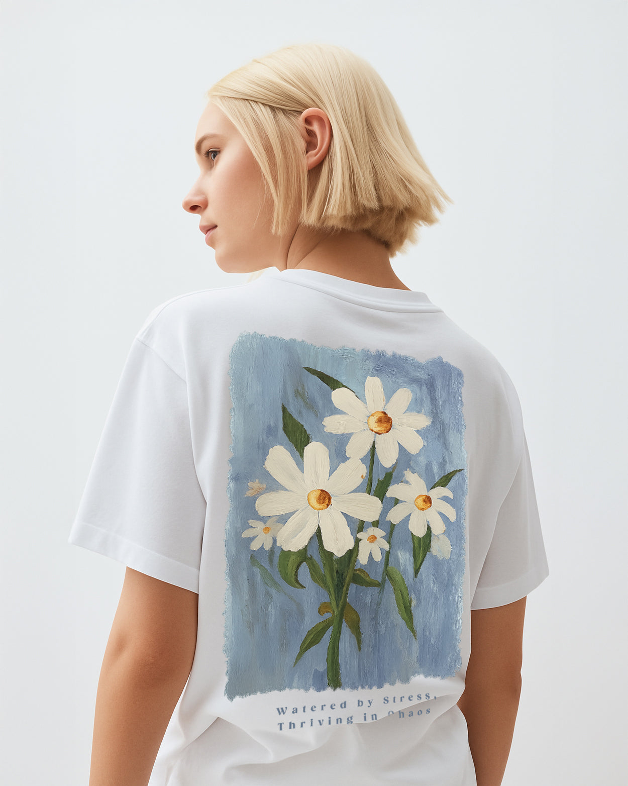 GRPHX Bloom Through Chaos back view – white oversized cotton tee