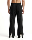 GRPHX Minimal Black Track Pants back view – relaxed fit